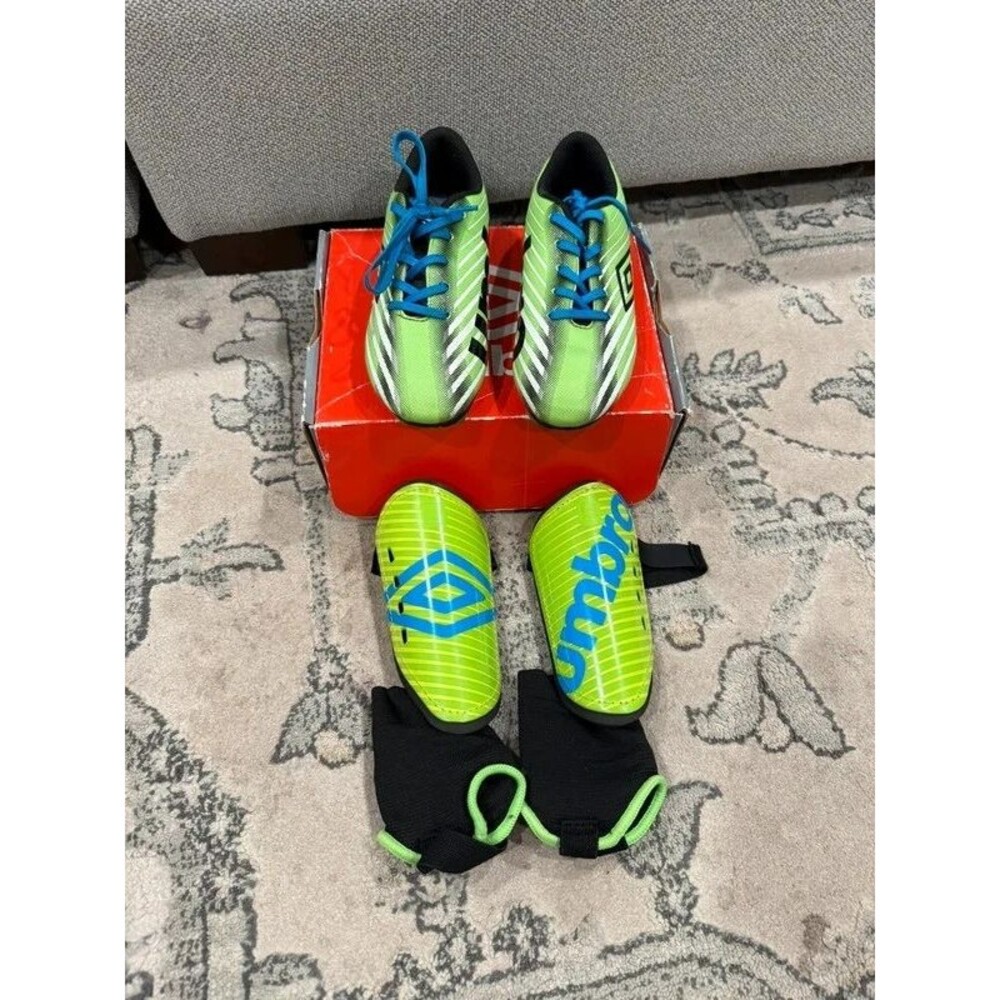 Umbro Shin Guard Size M and Soccer Cleats size 13K